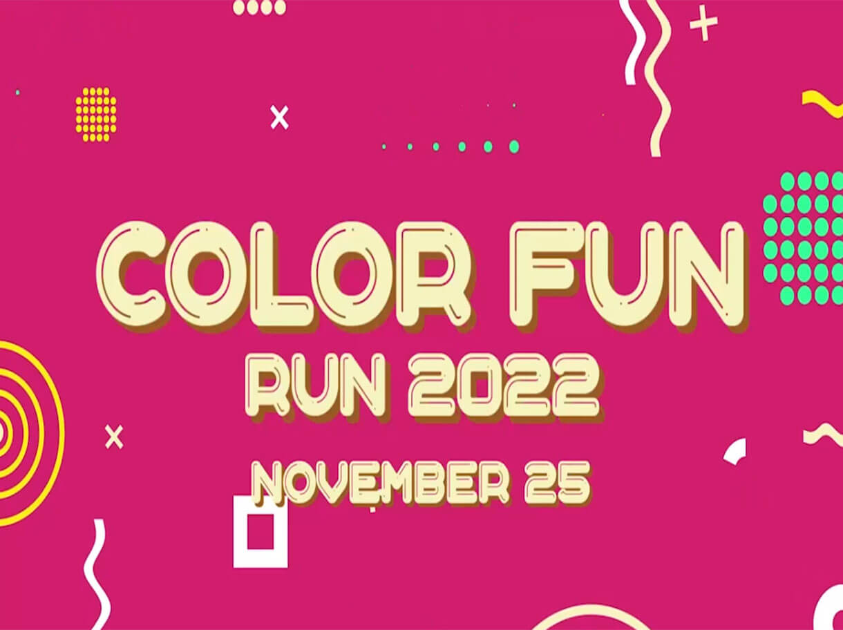 Bright pink poster reading "COLOR FUN RUN 2022 November 25" with bold retro lettering and playful geometric confetti accents.